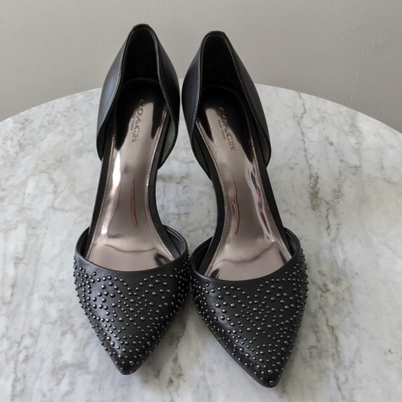 coach studded pumps